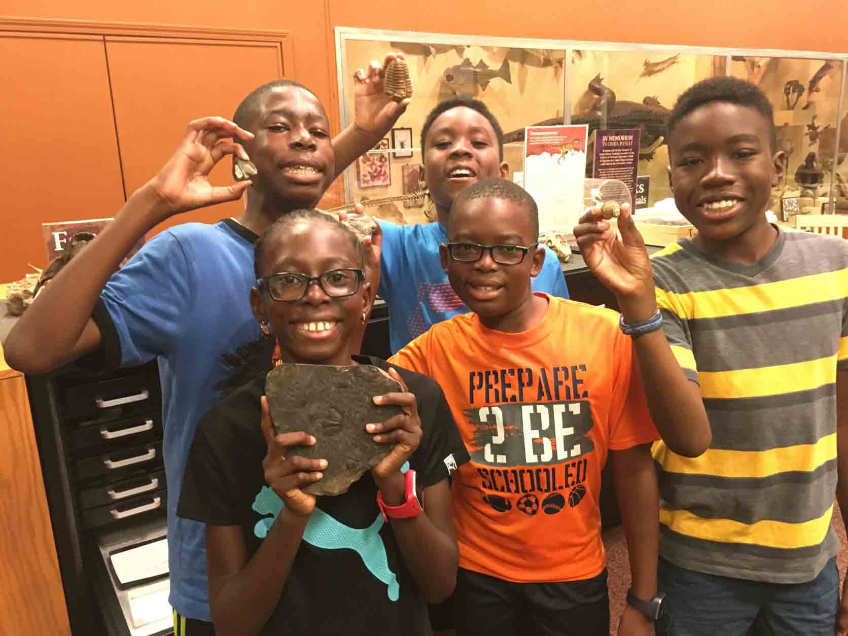 Students showing specimens at Museum of York County